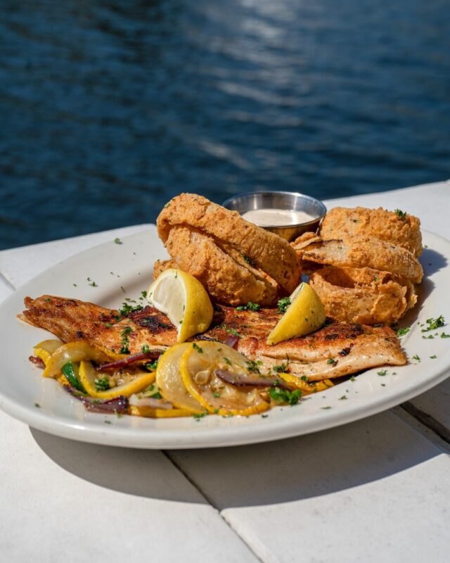 Golden, grilled, and gone in 60 seconds. You’ve been warned ‼️‼️ 
.
.
.
Grilled Fish, Fresh Catch, Seafood Plate, Waterfront Dining, Lemon Butter, Hush Puppies, Weekend Bite, NOLA Seafood, Outdoor Lunch, Saturday Special